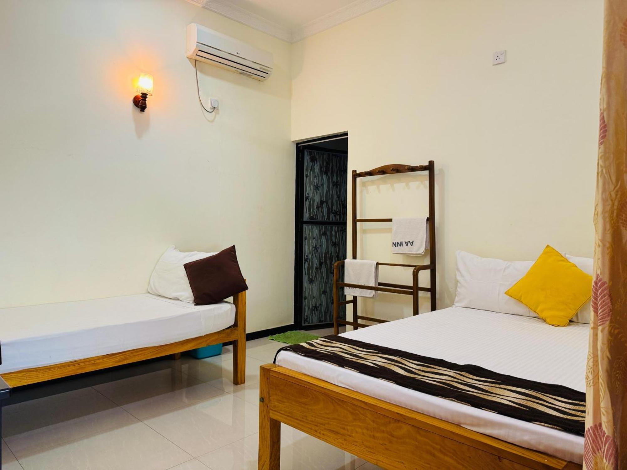 Aa Inn Тринкомали Номер фото