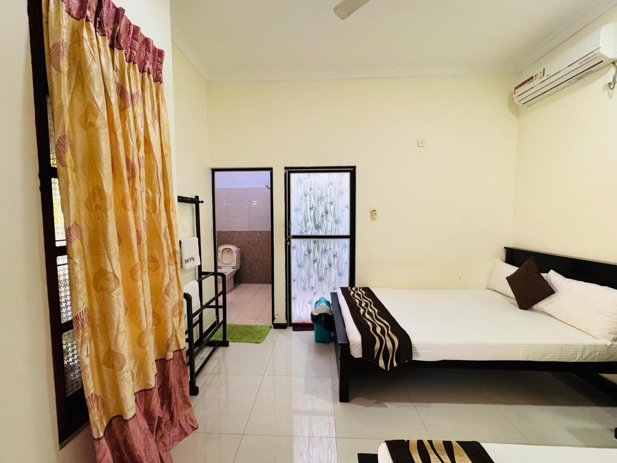 Aa Inn Тринкомали Номер фото